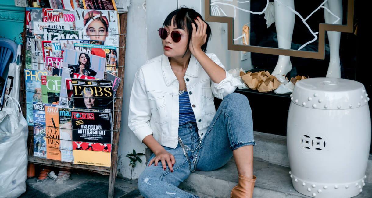 Photo Of Woman Sitting Near Magazines 3062608201 2